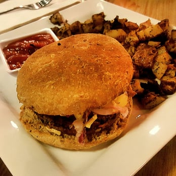 Earth Bistro - Vegan Aloha Burger with a bean patty substitute with roasted herb potatoes. - Pizza Near Me - Temecula, California