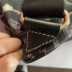 Custom Shoe Repair & Dry Cleaners - You can see the threads and how it isn't back in the original place