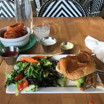 The 18hundred - grilled chicken sandwich with a side of onion rings - New American Near Me - Bakersfield, California The 18hundred - grilled chicken sandwich with a side of onion rings - New American Near Me - Bakersfield, California