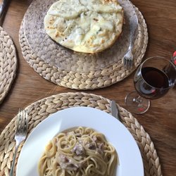 Vini D'Italia - Spaghetti alla puttanesca and Focaccia con patate e cipolle. It was delicious and filling. The service was amazing.