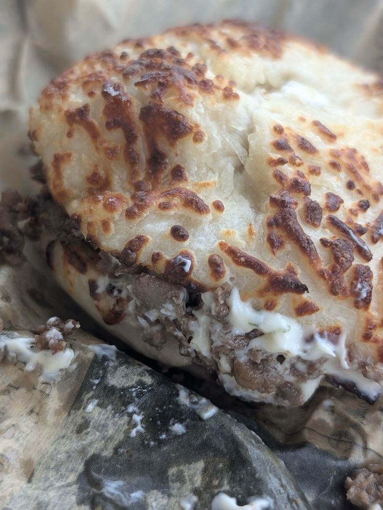 The Grumpy Grizzly Logo