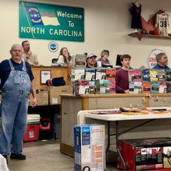 Thad Woods Auction - Auctioneer Stacy Woods and auction staff