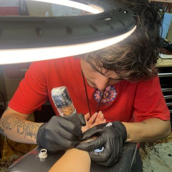 Above All Tattoo - Erik doing amazing tattoo in my wrist - Tattoo Near Me - San Diego, California Above All Tattoo - Erik doing amazing tattoo in my wrist - Tattoo Near Me - San Diego, California