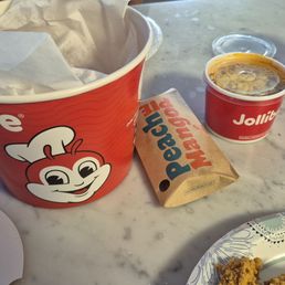 Picked up a bucket of chicken with a large gravy and mango pie. Picked up a bucket of chicken with a large gravy and mango pie.