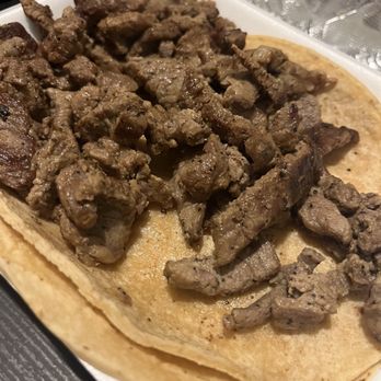 Roberto's Taco Shop - Plain asada taco. Made 1 taco for me and one for my pup. - Mexican Near Me - National City, California
