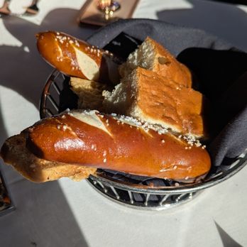 Mastro's Steakhouse - Bread basket...the pretzel bread is my fav but everyone else loves the garlic cheese bread! - Steakhouses Near Me - Scottsdale, Arizona