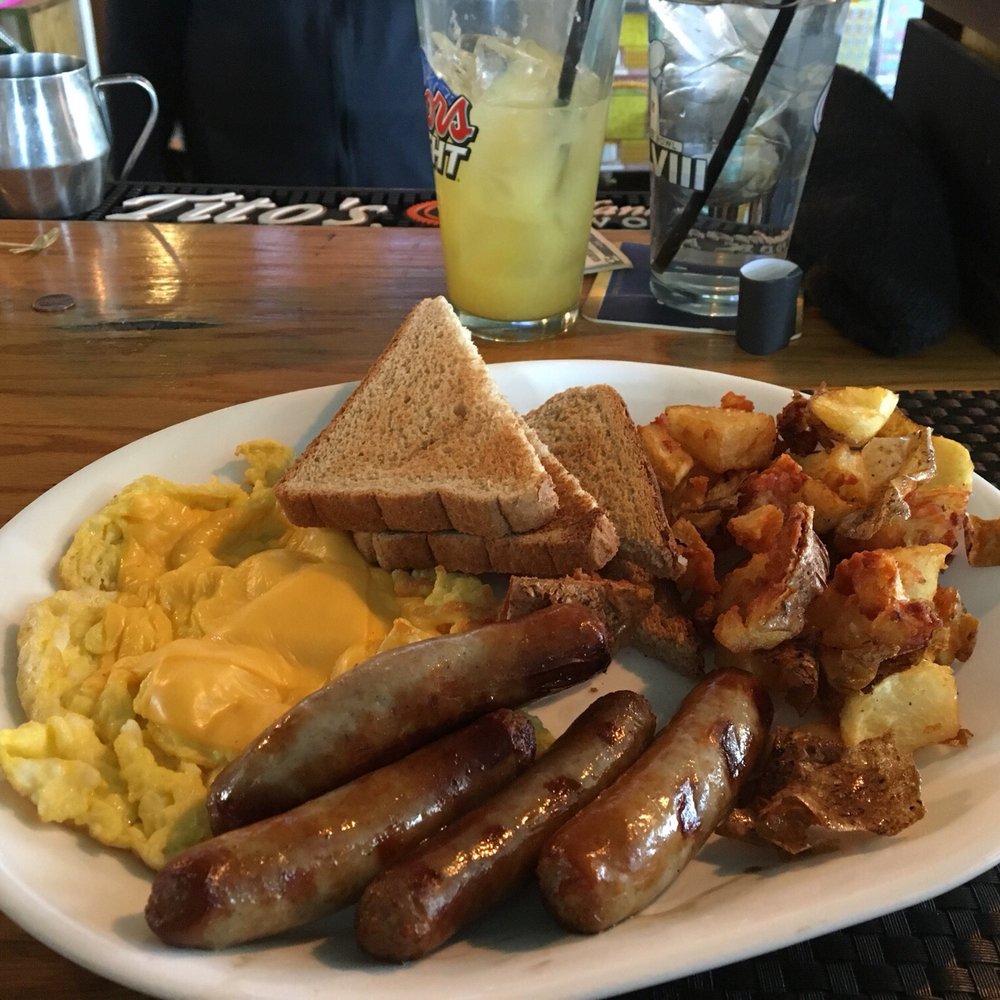 British breakfast Bangers and scrambled eggs. Plus a screw driver hey why not? British breakfast Bangers and scrambled eggs. Plus a screw driver hey why not?