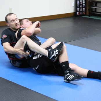 Weissmuller Academy - Transitioning from Hooks to Body Lock, Mindful of Foot Placement - Martial Arts Near Me - North Stonington, Connecticut Weissmuller Academy - Transitioning from Hooks to Body Lock, Mindful of Foot Placement - Martial Arts Near Me - North Stonington, Connecticut