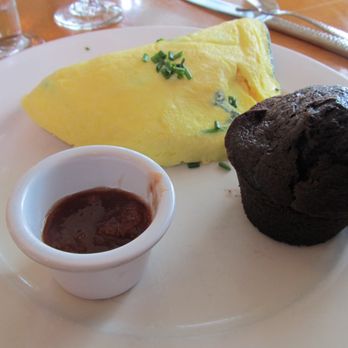 Sarabeth's Key West - Spinach & Goat Cheese Omelet with muffin and jelly, both made in house. - American Near Me - Key West, Florida Sarabeth's Key West - Spinach & Goat Cheese Omelet with muffin and jelly, both made in house. - American Near Me - Key West, Florida