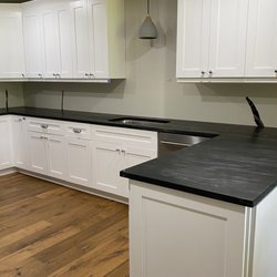 A & S Granite and Marble - Our plumber cannot install our faucet until it is finished. They also messed up the back corner seam. It looks like a two year old cut it.