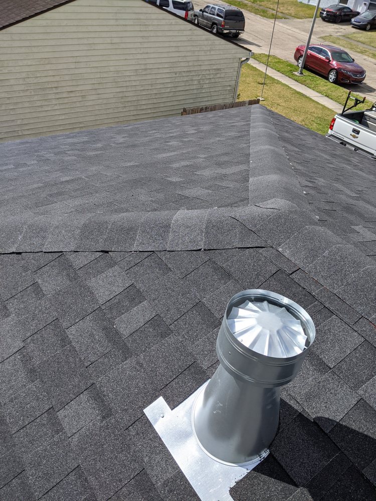 Slide of Above Standard Roofing