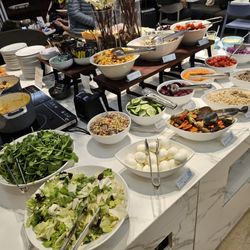 American Express Centurion Lounge - DIY salad bar. Some hot foods and sandwiches to the left
