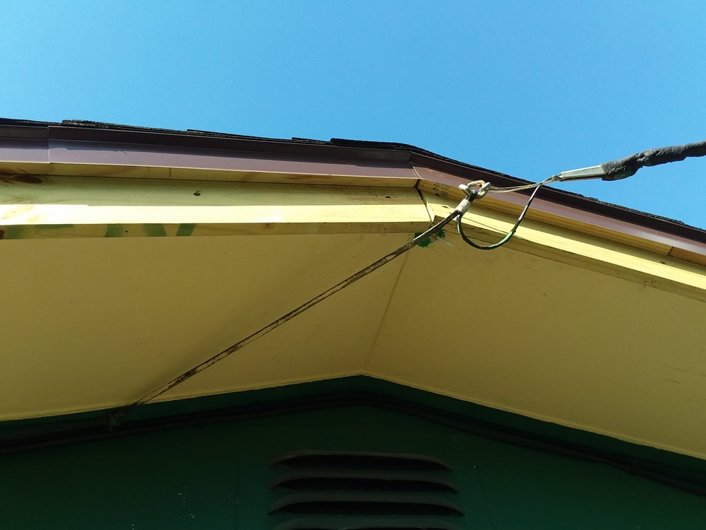 Slide of Father and Son Roofing