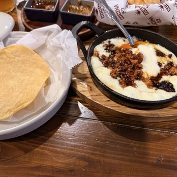 Cocina 53 - Queso fundido con chorizo. Its with queso oaxaca - Mexican Near Me - Bolingbrook, Illinois Cocina 53 - Queso fundido con chorizo. Its with queso oaxaca - Mexican Near Me - Bolingbrook, Illinois