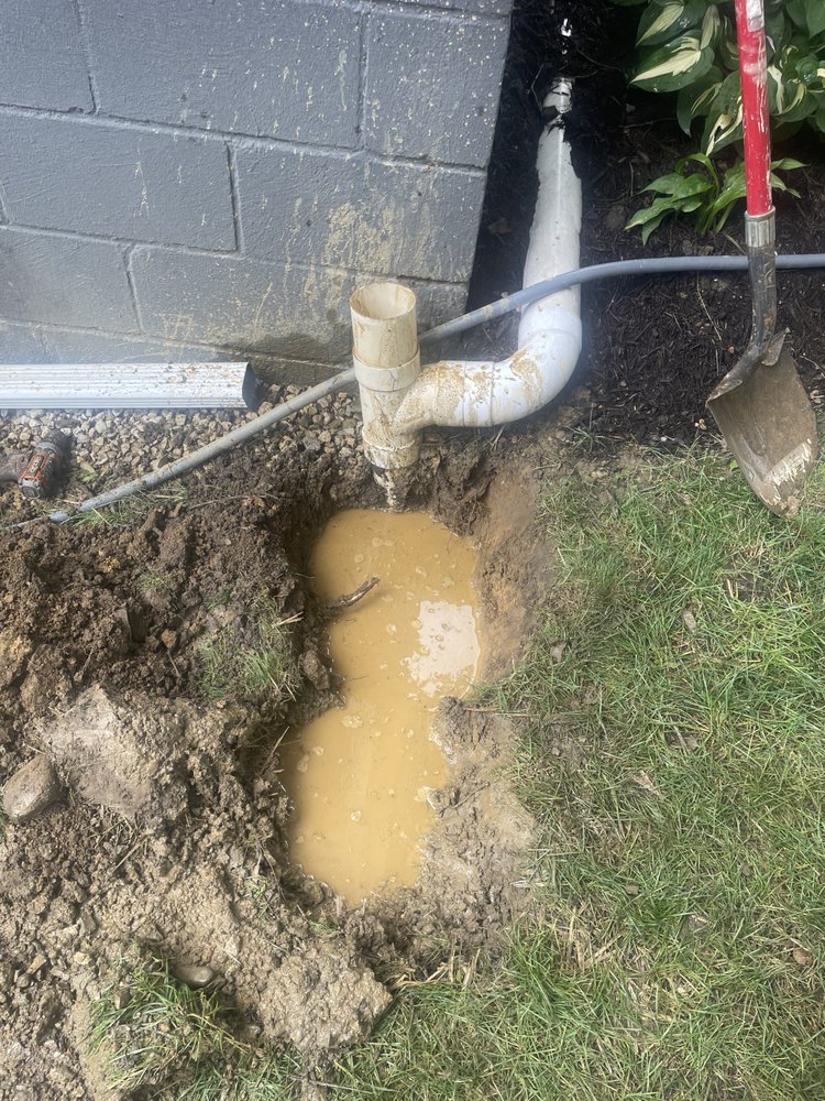 Slide of Dan's Drain Services