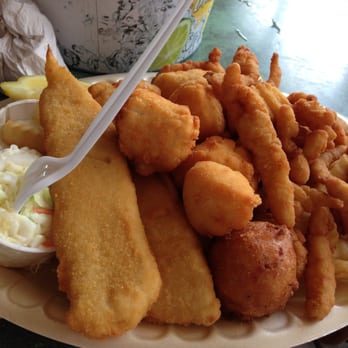 Our Deck Down Under - Fried Seafood Dinner (fish, clams, and scallops) with fries, slaw and pups. - Seafood Near Me - Port Orange, Florida Our Deck Down Under - Fried Seafood Dinner (fish, clams, and scallops) with fries, slaw and pups. - Seafood Near Me - Port Orange, Florida