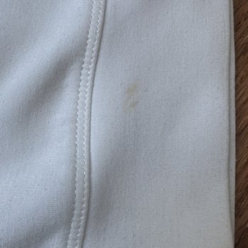 The blouse looks grey after washing with ping. I can't wear this snymore