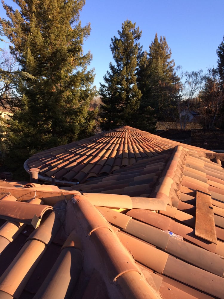 Slide of Landmark Roofing