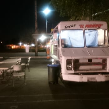 Tacos El Pariente - a taco truck parked in a parking lot - Mexican Near Me - Turlock, California Tacos El Pariente - a taco truck parked in a parking lot - Mexican Near Me - Turlock, California