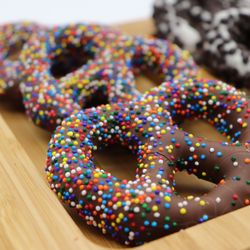 Simply Sweet - We have a wide variety of hand dipped chocolate covered pretzels! Including flavors like rainbow sprinkles, kit-kat, & MORE!