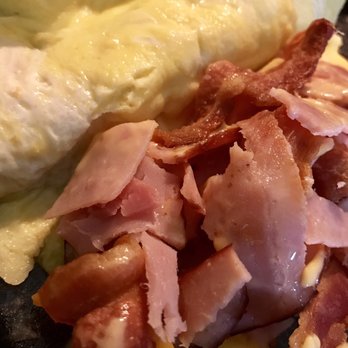 Sami's Cafe - Close-up of 2 Egg Ham & Cheese Omelette with Bacon added - YUM!!! (The cheese is hiding under all the meat!) - Cafes Near Me - Knoxville, Tennessee Sami's Cafe - Close-up of 2 Egg Ham & Cheese Omelette with Bacon added - YUM!!! (The cheese is hiding under all the meat!) - Cafes Near Me - Knoxville, Tennessee