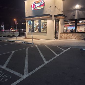 Raising Cane's Chicken Fingers - the outside of a restaurant at night - Fast Food Near Me - Maplewood, Minnesota Raising Cane's Chicken Fingers - the outside of a restaurant at night - Fast Food Near Me - Maplewood, Minnesota