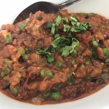IndianBistro14 - Mashed eggplant with peas. - Indian Near Me - Arlington, Texas IndianBistro14 - Mashed eggplant with peas. - Indian Near Me - Arlington, Texas