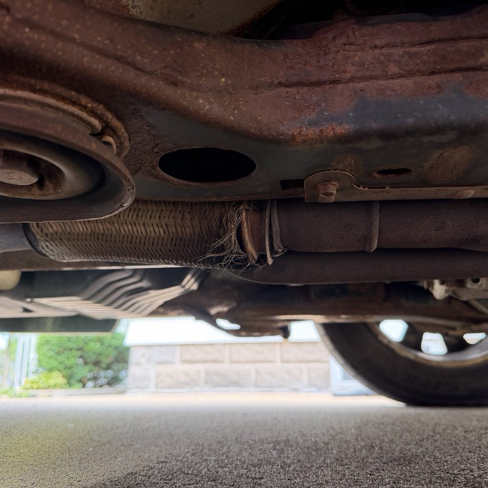 Mighty Muffler - Mesh flex pipe frayed and rusted . He cut the pipe welded w new one and we were on our way! - Auto Repair Near Me - Eau Claire, Wisconsin