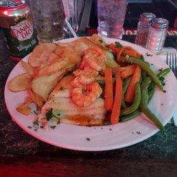 Broiled flounder with shrimp. Veggies and homemade chips
