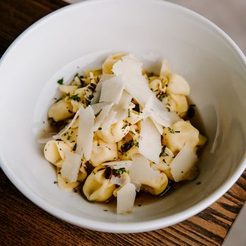 Nomad - a bowl of pasta with parmesan cheese - Desserts Near Me - Bay Harbor, Michigan