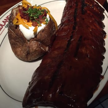 J. Alexander's - Ribs with loaded potato - Steakhouses Near Me - Memphis, Tennessee J. Alexander's - Ribs with loaded potato - Steakhouses Near Me - Memphis, Tennessee