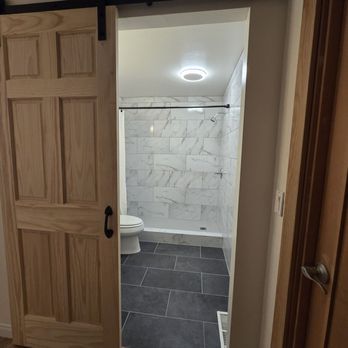 TNT Tile - Yes, the door mounting was included in the scope of work! - Tiling Near Me