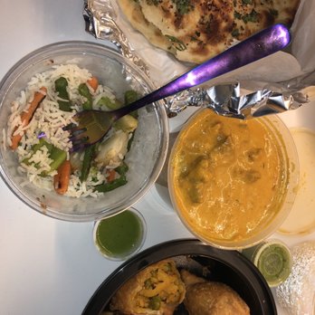 Bombay Social - Garlic Naan, 2 Vegetable Samosa, lamb korma, sautéed veggies. - Indian Near Me - Cambridge, Maryland Bombay Social - Garlic Naan, 2 Vegetable Samosa, lamb korma, sautéed veggies. - Indian Near Me - Cambridge, Maryland
