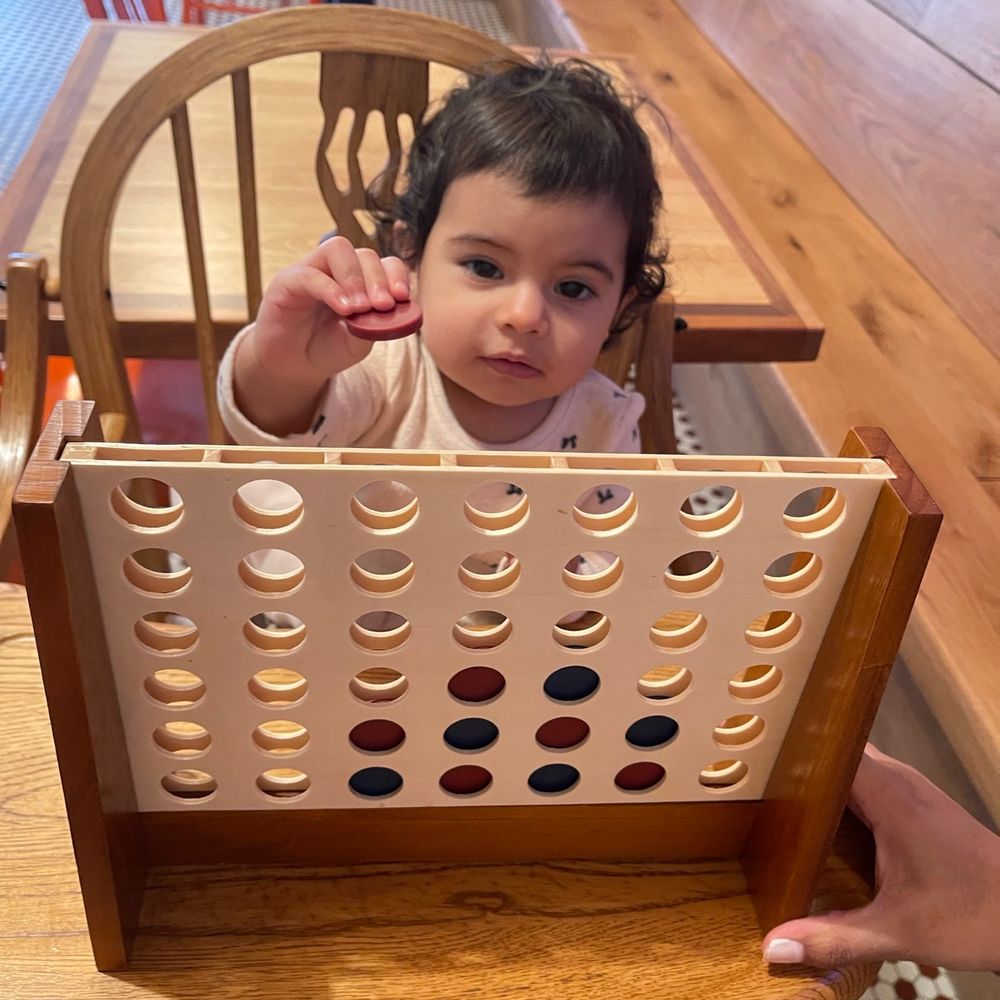 a baby in a high chair