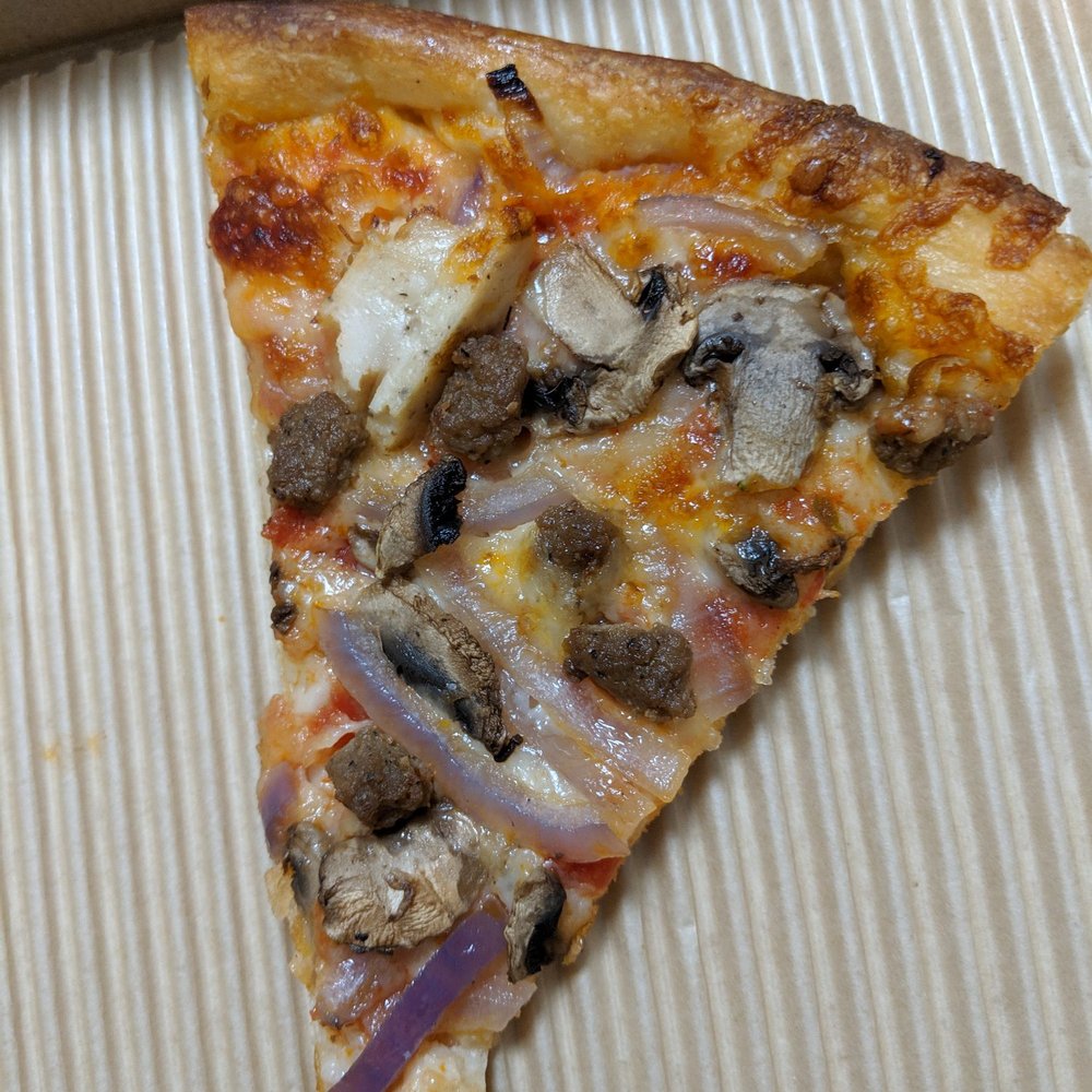 Pizza Nova - Medium four-topping pizza - slice has chicken, sausage, mushrooms, and onions - Pizza Near Me - Toronto, Ontario Pizza Nova - Medium four-topping pizza - slice has chicken, sausage, mushrooms, and onions - Pizza Near Me - Toronto, Ontario