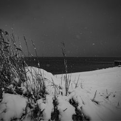 Venetian Shores - Snow covered dunes and a silent boat ramp in December.