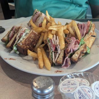 Russell's Marina Grill - Club sandwich... Delicious - Breakfast & Brunch Near Me - New Orleans, Louisiana Russell's Marina Grill - Club sandwich... Delicious - Breakfast & Brunch Near Me - New Orleans, Louisiana