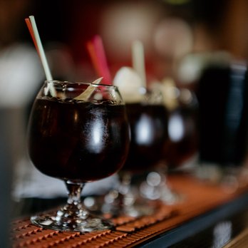 Leku Ona - a row of glasses filled with drinks - Basque Near Me - Boise, Idaho Leku Ona - a row of glasses filled with drinks - Basque Near Me - Boise, Idaho