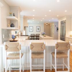 KRB Kitchen and Bath Design Center - The design of this beautiful kitchen was inspired by it's coastal location. The calm shades of white and blue create a serene environment.