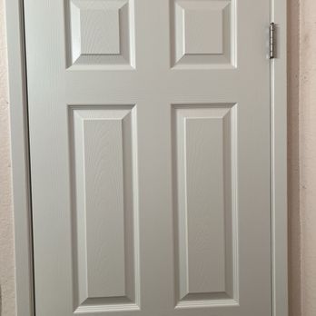 Nelson Construction - New door installed on existing frame, with fresh paint and a new lockset installed. - General Contractors Near Me Nelson Construction - New door installed on existing frame, with fresh paint and a new lockset installed. - General Contractors Near Me