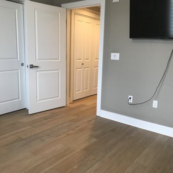 Bare Renovation - Nice transition work to make the flooring flow from the original to the new. - General Contractors Near Me - Peoria, Arizona