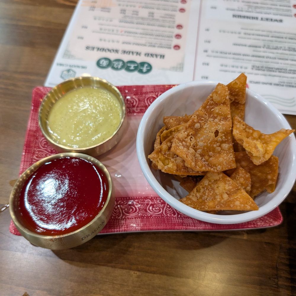 Dragon Casa - Chips with salsa and sweet dipping sauce (the salsa isn't spicy but it has good flavor) - Asian Fusion Near Me - Dallas, Texas