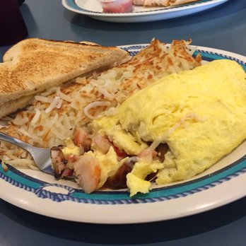 Benson's by the Beach - Crab omelette with Swiss and roasted garlic with sourdough toast and hashbrowns - Breakfast & Brunch Near Me - Long Beach, Washington Benson's by the Beach - Crab omelette with Swiss and roasted garlic with sourdough toast and hashbrowns - Breakfast & Brunch Near Me - Long Beach, Washington