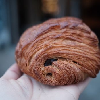 Tabor Bread - a hand holding a croissant - Bakeries Near Me - Portland, Oregon Tabor Bread - a hand holding a croissant - Bakeries Near Me - Portland, Oregon