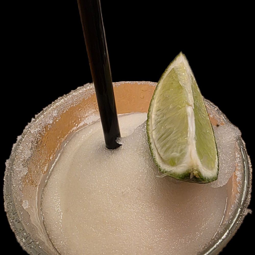 A $5 frozen house margarita with a sugared rim