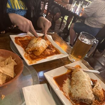 Yoli's Mexican Grill - Wet chicken burrito with rich and cheese - Mexican Near Me - Riverside, California Yoli's Mexican Grill - Wet chicken burrito with rich and cheese - Mexican Near Me - Riverside, California