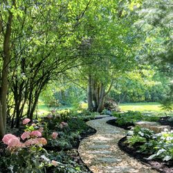 Amliv Land Designs - River rock path through your shade garden