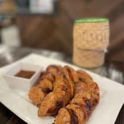 Seen Lod (Lao Sausage) $20 | Spicy herb pork sausage served w Laotian tomato sauce.