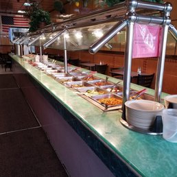 a buffet with a variety of food items