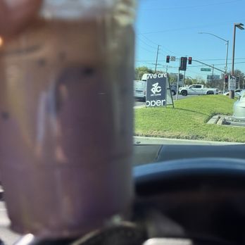 Arc Coffee - Honey butter ube latte in front of their corner signage - Coffee & Tea Near Me - Buena Park, California Arc Coffee - Honey butter ube latte in front of their corner signage - Coffee & Tea Near Me - Buena Park, California